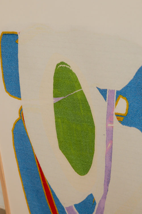 Art print with an abstract artwork featuring soft, overlapping shapes and a grainy texture. Blue tones meet light fields and are framed by a distinct green core. Styled in a minimalist interior.