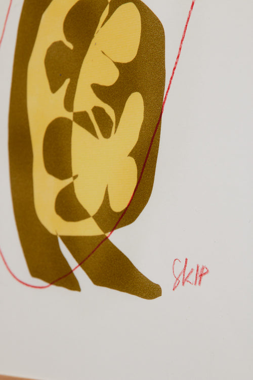 Art print with an abstract illustration of a softly shaped silhouette jumping rope. Grainy texture, hand-drawn lines, and warm ochre and sand tones meet graphic red accents. Styled in a minimalist interior.