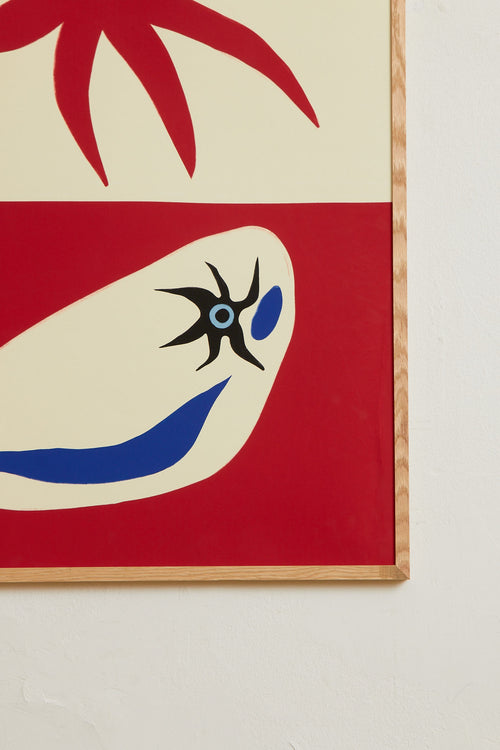 Art print with a graphic, minimalist artwork in red and off-white where organic shapes meet sharp symbols in a playful yet balanced expression. Styled in a minimalist interior.