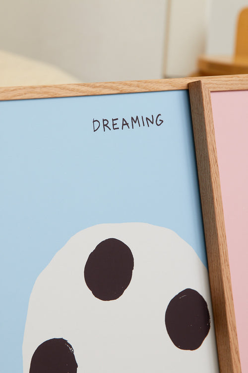 Close-up detail of the print with the small title text visible