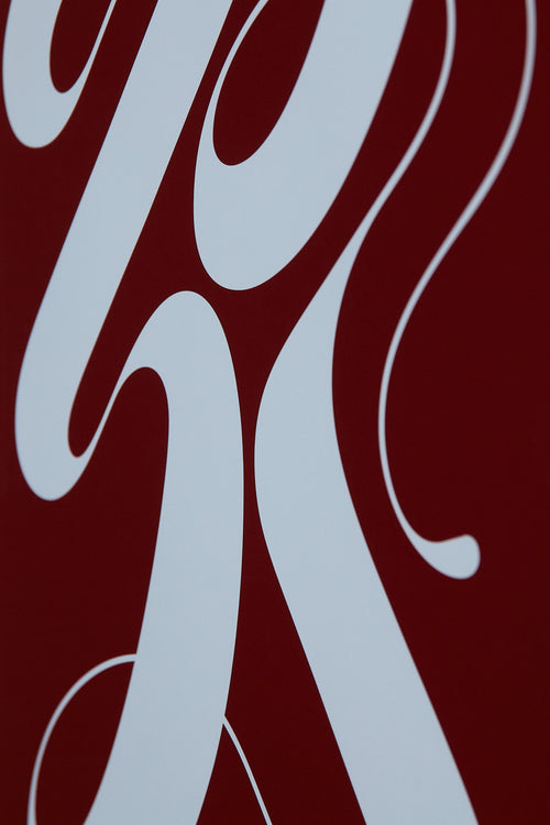 Art print featuring exploratory organic forms emerging in burgundy and blue. Styled in a minimalist interior.