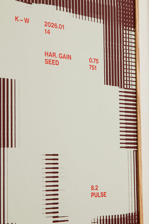 Art print with a graphic illustration of rectangular fields and linear patterns, combined with small text elements, in red and blue RAL colors. Styled in a minimalist interior.