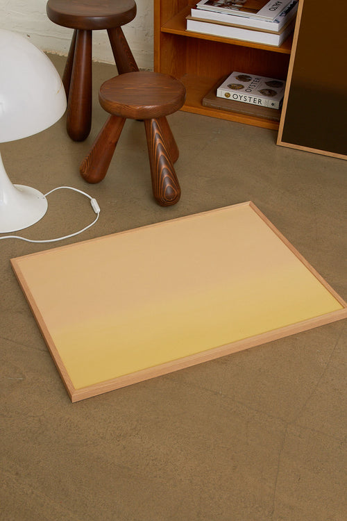 Gradient color swatch from beige to gold on a white background