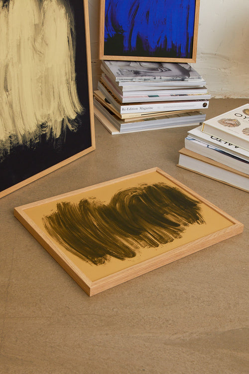 Abstract brown brush strokes on a beige background