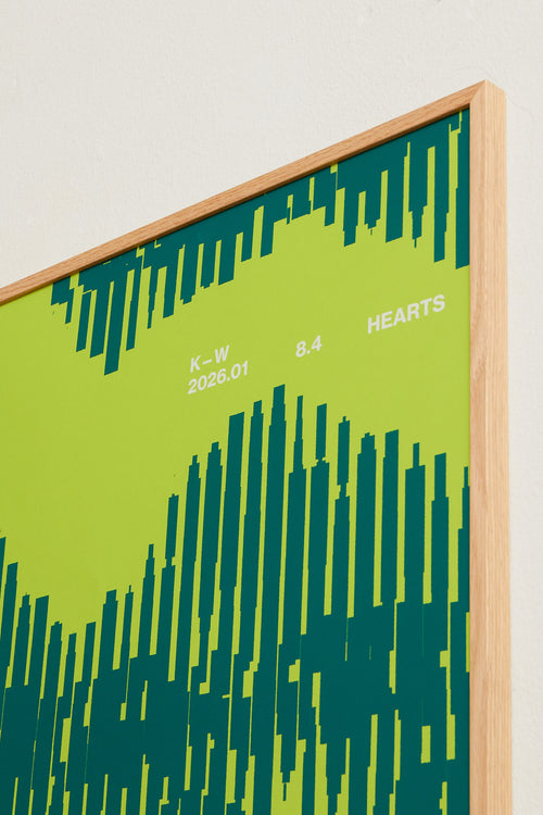 Art print with a graphic illustration of organic, vertical line patterns forming abstract shapes, complemented by small text elements, in green RAL colors. Styled in a minimalist interior.