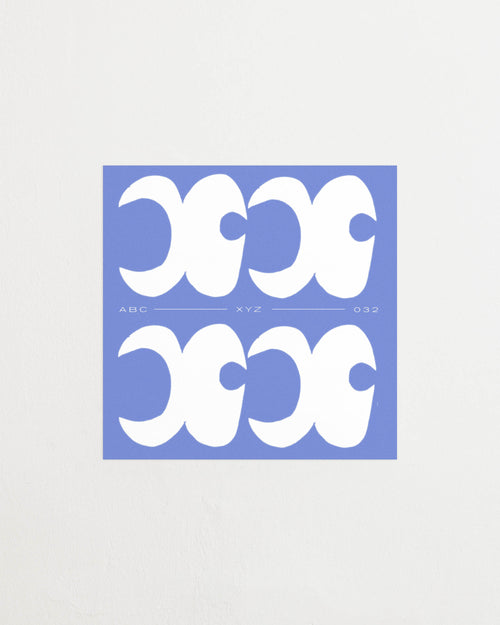 Square-format Art print with a graphic interpretation of the letter “X”. Created in white against a calm blue, lightly grain-textured background. Featured against a light background.