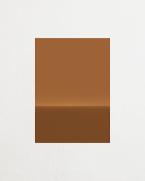 Art print with an abstract spray painting of a dark sky in deep yellow-brown tones. Featured against a light background.