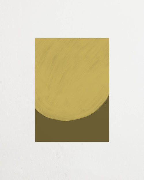 Art print with a minimalist illustration of a large, rounded color field in a yellow tone against a green background. Styled in a minimalist interior.