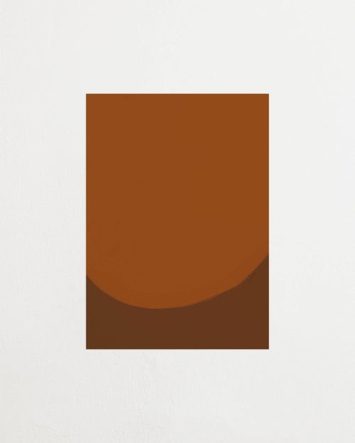 Art print with a minimalist illustration of a large, rounded color field in an orange tone against a brown-orange background. Styled in a minimalist interior.