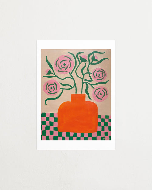 Ranunculus in orange vase
