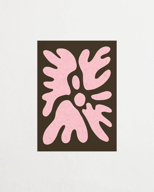 Art print featuring a minimalistic motif in chocolate brown and pastel pink, with shapes that explore the space between abstraction and recognition through soft, fluid forms. Styled in a minimalist interior.