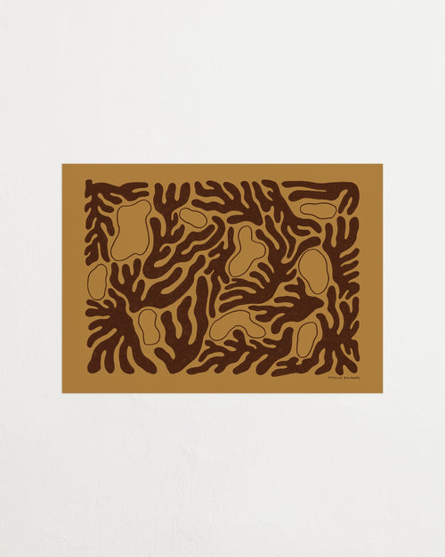 Brown doormat with abstract leaf pattern on a white background