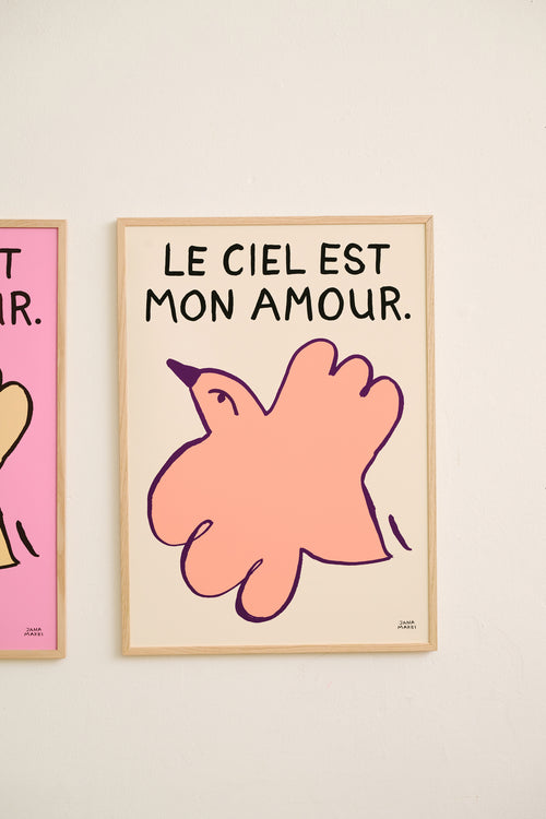 Framed poster “Le Ciel Dusty Beige” with a peach-pink bird and the text LE CIEL EST MON AMOUR on white.