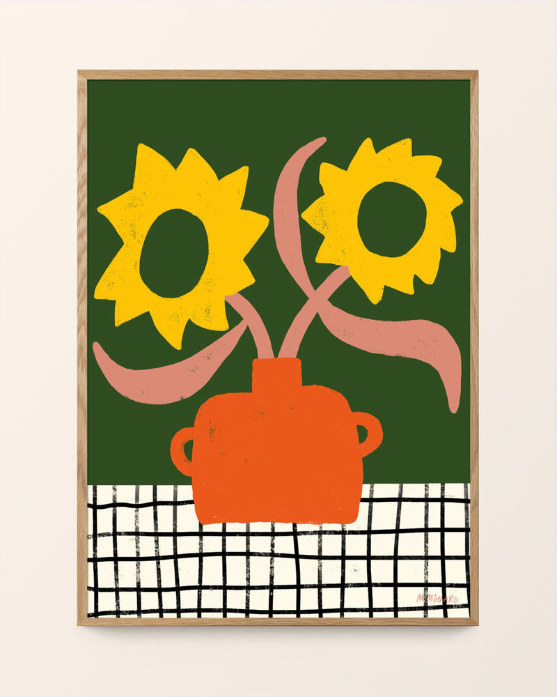 Sunflowers in orange vase